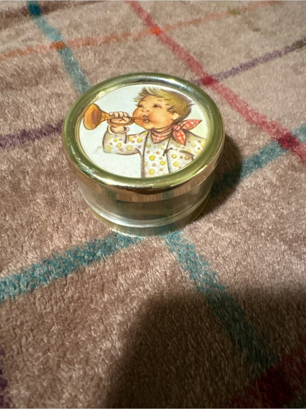 Vintage round acrylic music box with a Hummel-style illustration on the lid